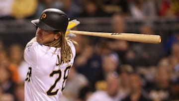 Jun 7, 2016; Pittsburgh, PA, USA; Pittsburgh Pirates first baseman John Jaso (28) singles against the New York Mets during the seventh inning in game two of a double header at PNC Park. Mandatory Credit: Charles LeClaire-USA TODAY Sports