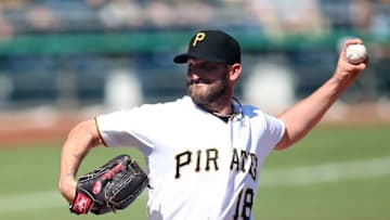 Jun 7, 2016; Pittsburgh, PA, USA; Pittsburgh Pirates starting pitcher Jonathon Niese (18) delivers a pitch against the New York Mets during the first inning at PNC Park. Mandatory Credit: Charles LeClaire-USA TODAY Sports