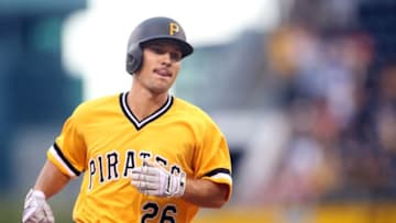 Jul 24, 2016; Pittsburgh, PA, USA; Pittsburgh Pirates pinch hitter Adam Frazier (26) circles the bases on a solo home run against the Philadelphia Phillies during the seventh inning at PNC Park. Mandatory Credit: Charles LeClaire-USA TODAY Sports