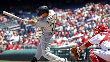 Jul 17, 2016; Washington, DC, USA; Pittsburgh Pirates second baseman Adam Frazier (26) hits a double against the Washington Nationals in the first inning at Nationals Park. Mandatory Credit: Geoff Burke-USA TODAY Sports