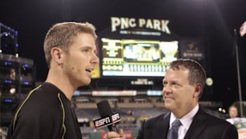 Jun 24, 2016; Pittsburgh, PA, USA; Pittsburgh Pirates starting pitcher Chad Kuhl (left) is interviewed by ESPN network baseball analyst Buster Olney (right) after earning his first major league win against the Los Angeles Dodgers at PNC Park. The Pirates won 4-3. Mandatory Credit: Charles LeClaire-USA TODAY Sports