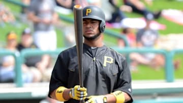 Mar 5, 2016; Lake Buena Vista, FL, USA; Pittsburgh Pirates catcher Elias Diaz (32) prepares to take batting practice before the start of a spring training game against the Atlanta Braves at Champion Stadium. Mandatory Credit: Jonathan Dyer-USA TODAY Sports