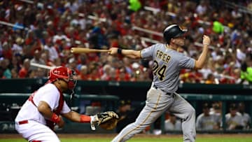 Jul 5, 2016; St. Louis, MO, USA; Pittsburgh Pirates catcher Eric Fryer (24) hits a two run double off of St. Louis Cardinals starting pitcher Mike Leake (not pictured) during the sixth inning at Busch Stadium. Mandatory Credit: Jeff Curry-USA TODAY Sports