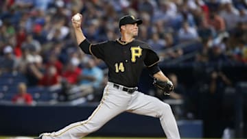 Aug 4, 2016; Atlanta, GA, USA; Pittsburgh Pirates starting pitcher Ryan Vogelsong (14) throws a pitch against the Atlanta Braves in the first inning at Turner Field. Mandatory Credit: Brett Davis-USA TODAY Sports