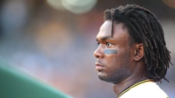 Aug 23, 2016; Pittsburgh, PA, USA; Pittsburgh Pirates first baseman Josh Bell (55) looks on from the dugout against the Houston Astros during the first inning at PNC Park. Mandatory Credit: Charles LeClaire-USA TODAY Sports