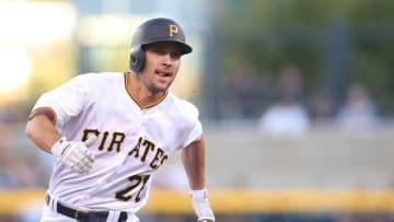 Aug 23, 2016; Pittsburgh, PA, USA; Pittsburgh Pirates second baseman Adam Frazier (26) runs the bases on his way to scoring a run against the Houston Astros during the first inning at PNC Park. Mandatory Credit: Charles LeClaire-USA TODAY Sports