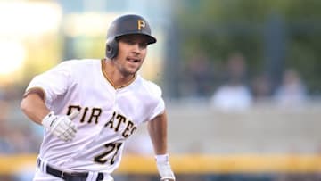 Aug 23, 2016; Pittsburgh, PA, USA; Pittsburgh Pirates second baseman Adam Frazier (26) runs the bases on his way to scoring a run against the Houston Astros during the first inning at PNC Park. Mandatory Credit: Charles LeClaire-USA TODAY Sports