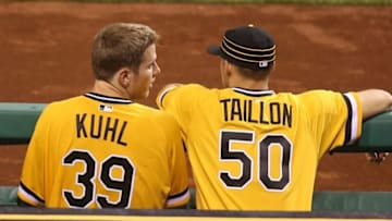 Jun 24, 2016; Pittsburgh, PA, USA; Pittsburgh Pirates starting pitcher Chad Kuhl (39) and pitcher Jameson Taillon (50) talk in the dugout against the Los Angeles Dodgers during the sixth inning at PNC Park. Mandatory Credit: Charles LeClaire-USA TODAY Sports