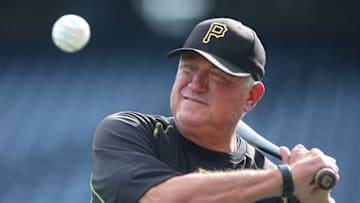 Aug 23, 2016; Pittsburgh, PA, USA; Pittsburgh Pirates manager Clint Hurdle (13) hits balls during infield practice before playing the Houston Astros at PNC Park. Mandatory Credit: Charles LeClaire-USA TODAY Sports