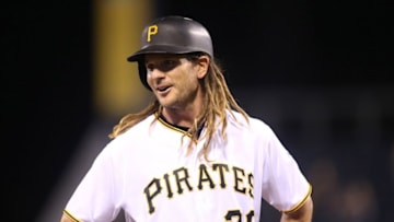 Sep 28, 2016; Pittsburgh, PA, USA; Pittsburgh Pirates first baseman John Jaso (28) reacts at third base after hitting a triple during the seventh inning to complete hitting for the cycle against the Chicago Cubs at PNC Park. Mandatory Credit: Charles LeClaire-USA TODAY Sports
