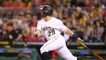 Sep 24, 2016; Pittsburgh, PA, USA; Pittsburgh Pirates catcher Francisco Cervelli (29) singles against the Washington Nationals during the second inning at PNC Park. Mandatory Credit: Charles LeClaire-USA TODAY Sports