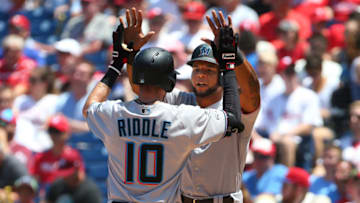 PHILADELPHIA, PA - JUNE 23: JT Riddle #10 of the Miami Marlins is congratulated by Cesar Puello #46 after hitting a two-run home run against the Philadelphia Phillies during the second inning of a baseball game at Citizens Bank Park on June 23, 2019 in Philadelphia, Pennsylvania. (Photo by Rich Schultz/Getty Images)