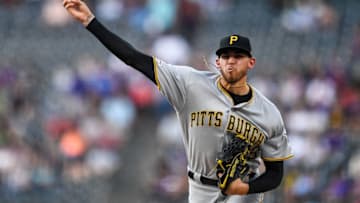 DENVER, CO - AUGUST 31: Joe Musgrove #59 of the Pittsburgh Pirates pitches against the Colorado Rockies in the first inning of a game at Coors Field on August 31, 2019 in Denver, Colorado. (Photo by Dustin Bradford/Getty Images)