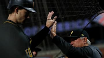 SAN FRANCISCO, CA - SEPTEMBER 09: Bryan Reynolds #10 of the Pittsburgh Pirates is being congratulated by Manager Clint Hurdle after being driven in by teammate Melky Cabrera #53 during the sixth inning against the San Francisco Giants at Oracle Park on September 9, 2019 in San Francisco, California. (Photo by Stephen Lam/Getty Images)
