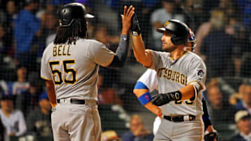 CHICAGO, IL - SEPTEMBER 24: Francisco Cervelli #29 of the Pittsburgh Pirates (R) celebrates his two run home run against the Chicago Cubs with Josh Bell #55 during the first inning at Wrigley Field on September 24, 2018 in Chicago, Illinois. (Photo by Jon Durr/Getty Images)