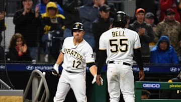 PITTSBURGH, PA - APRIL 05: Josh Bell #55 celebrates with JB Shuck #17 of the Pittsburgh Pirates after scoring during the seventh inning against the Cincinnati Reds at PNC Park on April 5, 2019 in Pittsburgh, Pennsylvania. (Photo by Joe Sargent/Getty Images)