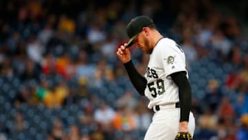PITTSBURGH, PA - MAY 30: Joe Musgrove #59 of the Pittsburgh Pirates reacts after giving up back-to-back home runs in the third inning against the Milwaukee Brewers at PNC Park on May 30, 2019 in Pittsburgh, Pennsylvania. (Photo by Justin K. Aller/Getty Images)