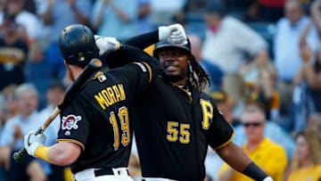 PITTSBURGH, PA - JULY 01: Josh Bell #55 of the Pittsburgh Pirates celebrates with Colin Moran #19 after hitting a three run home run in the first inning against the Chicago Cubs at PNC Park on July 1, 2019 in Pittsburgh, Pennsylvania. (Photo by Justin K. Aller/Getty Images)