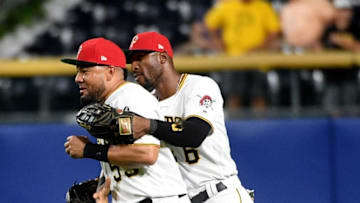 PITTSBURGH, PA - JULY 06: Melky Cabrera #53 of the Pittsburgh Pirates celebrates with Starling Marte #6 after the final out in a 12-2 win over the Milwaukee Brewers at PNC Park on July 6, 2019 in Pittsburgh, Pennsylvania. (Photo by Justin Berl/Getty Images)
