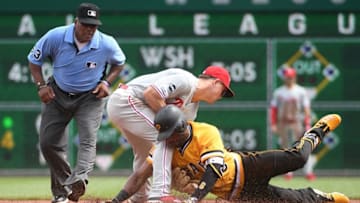 PITTSBURGH, PA - JULY 21: Starling Marte #6 of the Pittsburgh Pirates is tagged out at second base by Scott Kingery #4 of the Philadelphia Phillies in the sixth inning during the game at PNC Park on July 21, 2019 in Pittsburgh, Pennsylvania. (Photo by Justin Berl/Getty Images)