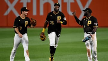 PITTSBURGH, PA - SEPTEMBER 04: Anthony Alford #6 of the Pittsburgh Pirates celebrates with Gregory Polanco #25 and Bryan Reynolds #10 after the final out of 4-3 win over the Cincinnati Reds during game two of a doubleheader at PNC Park on September 4, 2020 in Pittsburgh, Pennsylvania. (Photo by Justin Berl/Getty Images)
