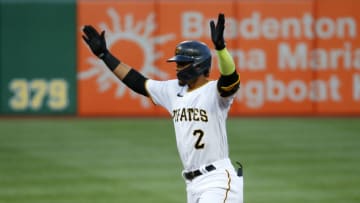 PITTSBURGH, PA - APRIL 13: Erik Gonzalez #2 of the Pittsburgh Pirates reacts after hitting a RBI double in the first inning against the San Diego Padres at PNC Park on April 13, 2021 in Pittsburgh, Pennsylvania. (Photo by Justin K. Aller/Getty Images)