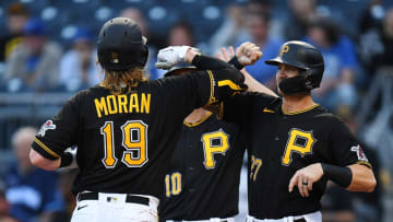 PITTSBURGH, PA - SEPTEMBER 28: Colin Moran #19 of the Pittsburgh Pirates celebrates with Kevin Newman #27 after hitting a three run home run during the first inning against the Chicago Cubs at PNC Park on September 28, 2021 in Pittsburgh, Pennsylvania. (Photo by Joe Sargent/Getty Images)