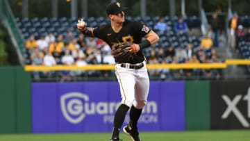 PITTSBURGH, PA - SEPTEMBER 30: Kevin Newman #27 of the Pittsburgh Pirates throws to first base to force out Frank Schwindel #18 of the Chicago Cubs in the first inning during the game at PNC Park on September 30, 2021 in Pittsburgh, Pennsylvania. (Photo by Justin Berl/Getty Images)