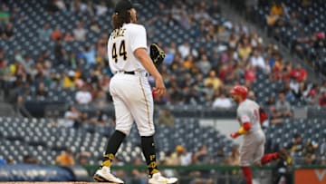 PITTSBURGH, PA - OCTOBER 03: Cody Ponce #44 of the Pittsburgh Pirates steps off the mound as Joey Votto #19 of the Cincinnati Reds rounds the bases after hitting a three run home run in the fifth inning during the game at PNC Park on October 3, 2021 in Pittsburgh, Pennsylvania. (Photo by Justin Berl/Getty Images)