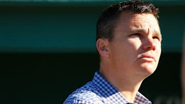 BOSTON, MA - MAY 6: Ben Cherington, general manager of the Boston Red Sox, watches batting practice from a the dugout before a game with the Minnesota Twins at Fenway Park on May 6, 2013 in Boston, Massachusetts. (Photo by Jim Rogash/Getty Images)