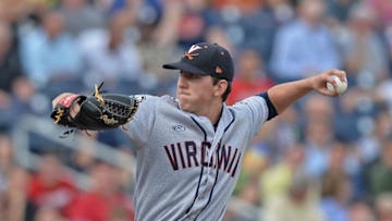 OMAHA, NE - JUNE 24: Brandon Waddell #20 of the Virginia Cavaliers delivers a pitch against the Vanderbilt Commodores in the first inning during game two of the College World Series Championship Series on June 24, 2014 at TD Ameritrade Park in Omaha, Nebraska. (Photo by Peter Aiken/Getty Images)