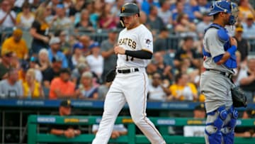 PITTSBURGH, PA - MAY 29: Austin Meadows #17 of the Pittsburgh Pirates scores on a RBI double in the first inning against the Chicago Cubs at PNC Park on May 29, 2018 in Pittsburgh, Pennsylvania. (Photo by Justin K. Aller/Getty Images)