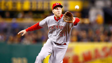 PITTSBURGH, PA - OCTOBER 03: Todd Frazier #21 of the Cincinnati Reds fields a ground ball in the 6th inning against the Pittsburgh Pirates during the game at PNC Park on October 3, 2015 in Pittsburgh, Pennsylvania. (Photo by Jared Wickerham/Getty Images)