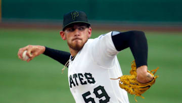 PITTSBURGH, PA - JULY 29: Joe Musgrove #59 of the Pittsburgh Pirates pitches in the first inning against the Milwaukee Brewers at PNC Park on July 29, 2020 in Pittsburgh, Pennsylvania. (Photo by Justin K. Aller/Getty Images)
