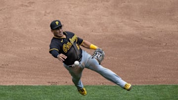 Aug 4, 2020; Minneapolis, Minnesota, USA; Pittsburgh Pirates third baseman Phillip Evans (64) throws the ball to first base during the second inning against the Minnesota Twins at Target Field. Mandatory Credit: Jordan Johnson-USA TODAY Sports