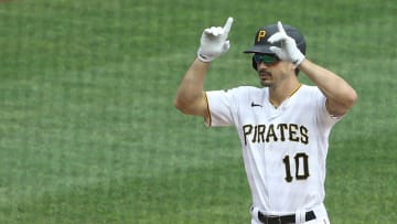 Sep 24, 2020; Pittsburgh, Pennsylvania, USA; Pittsburgh Pirates center fielder Bryan Reynolds (10) gestures crossing home plate on a solo home run against the Chicago Cubs during the second inning at PNC Park. Mandatory Credit: Charles LeClaire-USA TODAY Sports