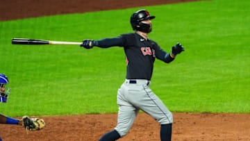 Aug 31, 2020; Kansas City, Missouri, USA; Cleveland Indians right fielder Tyler Naquin (30) bats against the Kansas City Royals at Kauffman Stadium. Mandatory Credit: Jay Biggerstaff-USA TODAY Sports