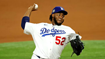 Oct 27, 2020; Arlington, Texas, USA; Los Angeles Dodgers relief pitcher Pedro Baez (52) pitches during the fifth inning against the Tampa Bay Rays during game six of the 2020 World Series at Globe Life Field. Mandatory Credit: Kevin Jairaj-USA TODAY Sports