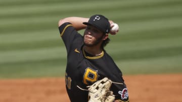 Mar 3, 2021; Port Charlotte, Florida, USA; Pittsburgh Pirates pitcher Miguel Yajure (50) throws a pitch during the second inning against the Tampa Bay Rays at Charlotte Sports Park. Mandatory Credit: Kim Klement-USA TODAY Sports