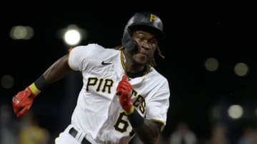 Oct 2, 2021; Pittsburgh, Pennsylvania, USA; Pittsburgh Pirates shortstop Oneil Cruz (61) runs the bases on his way to scoring a run against the Cincinnati Reds during the fifth inning at PNC Park. Mandatory Credit: Charles LeClaire-USA TODAY Sports