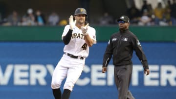 Apr 12, 2022; Pittsburgh, Pennsylvania, USA; Pittsburgh Pirates center fielder Jake Marisnick (41) reacts after hitting a double against the Chicago Cubs during the fifth inning at PNC Park. Mandatory Credit: Charles LeClaire-USA TODAY Sports