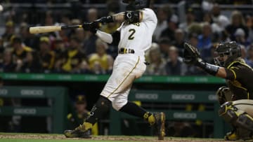 Apr 30, 2022; Pittsburgh, Pennsylvania, USA; Pittsburgh Pirates first baseman Michael Chavis (2) hits a two run home run against the San Diego Padres during the eighth inning at PNC Park. Mandatory Credit: Charles LeClaire-USA TODAY Sports