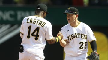 May 15, 2022; Pittsburgh, Pennsylvania, USA; Pittsburgh Pirates second baseman Rodolfo Castro (14) and Pittsburgh Pirates second baseman Josh VanMeter (26) celebrate after defeating the Cincinnati Reds at PNC Park. The Pirates won 1-0 despite being no hit by the Reds. Mandatory Credit: Charles LeClaire-USA TODAY Sports