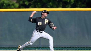 Feb 24, 2021; Bradenton, Florida, USA; Pittsburgh Pirates pitcher Roansy Contreras (59) warms up during spring training at Pirate City. Mandatory Credit: Jonathan Dyer-USA TODAY Sports