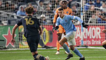 Nov 7, 2021; New York, New York, USA; New York City FC midfielder Alfredo Morales (7) defends against Philadelphia Union midfielder Jack McGlynn (16) during the second half at Yankee Stadium. Mandatory Credit: Vincent Carchietta-USA TODAY Sports