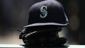 ANAHEIM, CA - JULY 29: A detailed view of a Seattle Mariners hat is seen on the dugout railing during the seventh inning of the MLB game between the Seattle Mariners and the Los Angeles Angels of Anaheim at Angel Stadium on July 29, 2018 in Anaheim, California. The Mariners defeated the Angels 8-5. (Photo by Victor Decolongon/Getty Images)
