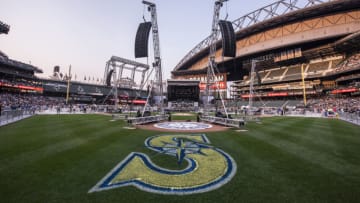 SEATTLE, WA - AUGUST 08: The Mariners logo is displayed on the infield grass alongside speaker towers before Pearl Jam's performance starts at Safeco Field on August 8, 2018 in Seattle, Washington. (Photo by Jim Bennett/Getty Images)