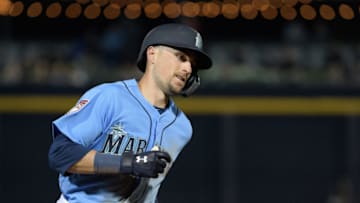 PEORIA, ARIZONA - MARCH 06: Braden Bishop #5 of the Seattle Mariners hits a three run home run against the Oakland Athletics during the spring training game at Peoria Stadium on March 06, 2019 in Peoria, Arizona. (Photo by Jennifer Stewart/Getty Images)