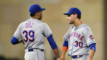 MINNEAPOLIS, MN - JULY 16: Edwin Diaz #39 and Michael Conforto #30 of the New York Mets celebrate defeating the Minnesota Twins after the interleague game on July 16, 2019 at Target Field in Minneapolis, Minnesota. The Mets defeated the Twins 3-2. (Photo by Hannah Foslien/Getty Images)
