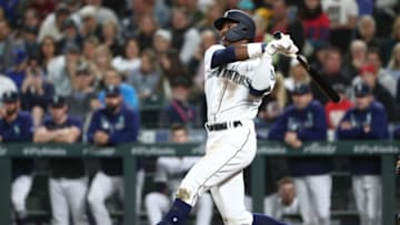 SEATTLE, WASHINGTON - SEPTEMBER 10: Kyle Lewis #30 of the Seattle Mariners swings at a pitch during his first career MLB at bat in the second inning against the Cincinnati Reds during their game at T-Mobile Park on September 10, 2019 in Seattle, Washington. (Photo by Abbie Parr/Getty Images)